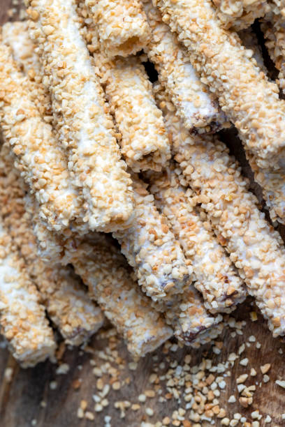 istock waffle tube with chocolate filling and crushed peanuts 1415922433