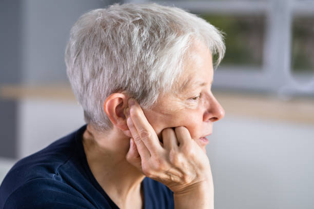 istock Hearing Aid And Painful Ear Ache 1415929669