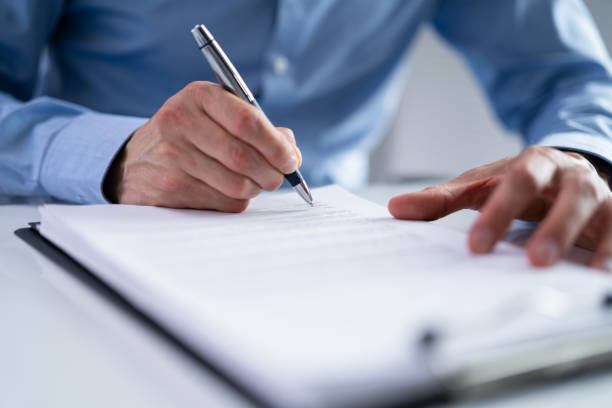 istock Legal Document Signature 1415930112