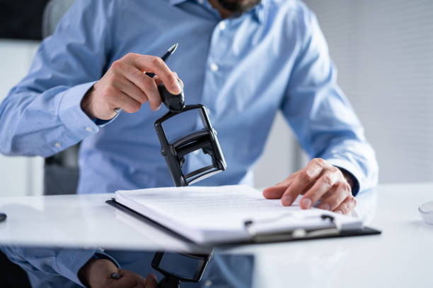 istock Trademark Protection Rubber Stamp On Paper 1415930119