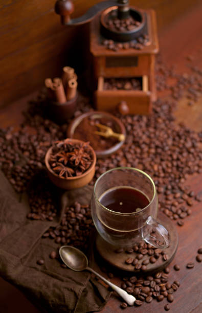 istock Cup Of Coffee And Coffee Beans On Table 1415931155