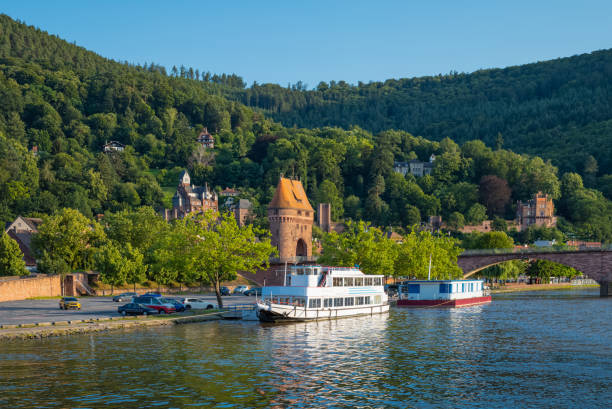 Miltenberg, Germany , the  old town with boat for tourists moored, seen from the River Main