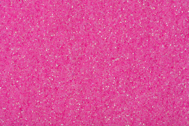 istock Shiny glitter in pink color, texture for stylish gift card. 1415931452