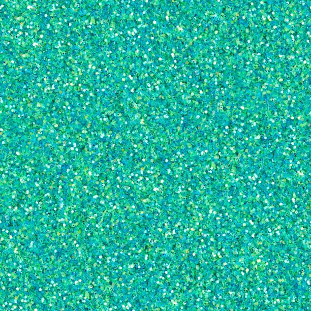 istock Elegant turquoise glitter, sparkle confetti texture. Christmas seamless pattern. 1415931460