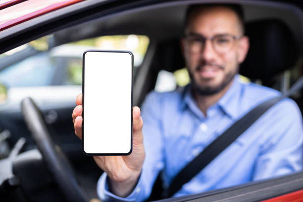 istock Man Hand Showing Mobile Phone 1415932568