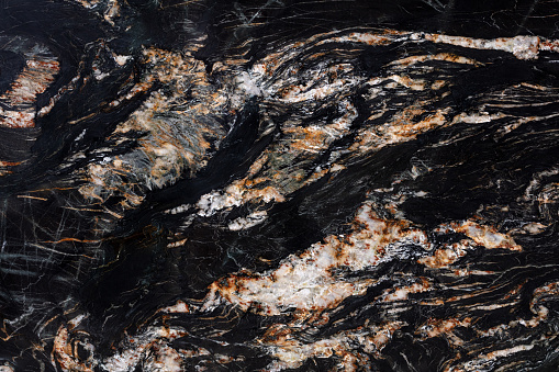 Superlative granite background for your personal interior work, texture in black color.