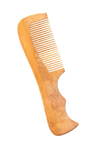 istock A wooden comb on white background 1415935277