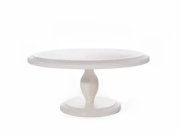 white wood stand with a leg, for desserts and cakes. Isolated stand on white background.