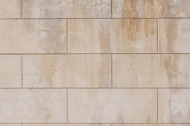 istock Part of an old stained concrete block wall 1415936563