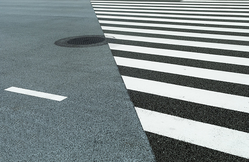 white stripes on the pedestrian roadway