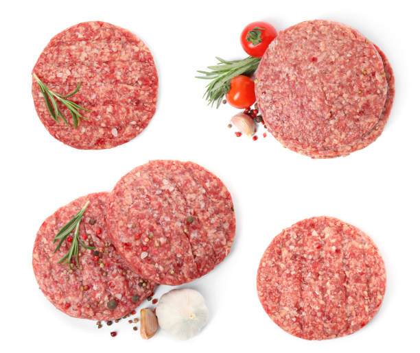 istock Set with fresh raw burger patties on white background, top view 1415945560