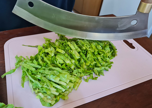 Cutting Lettuce for Salad