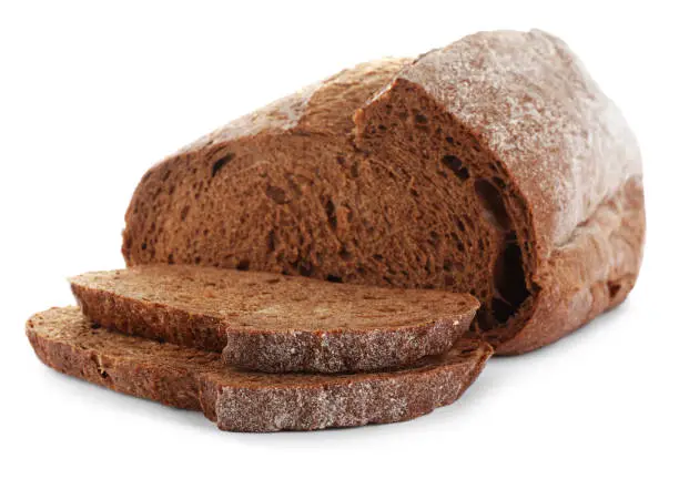 Freshly baked sodawater bread on white background, closeup