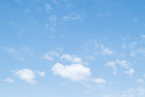 istock Blue sky background and white clouds soft focus, pastel sky. 1415947942