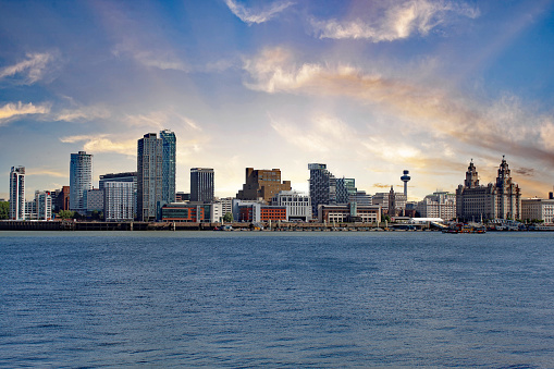 A beautiful landscape shot of the Liverpool skyline, this photo was taken from New Brighton Promenade across the River Mersey. This River is famous for its ferry crossings.