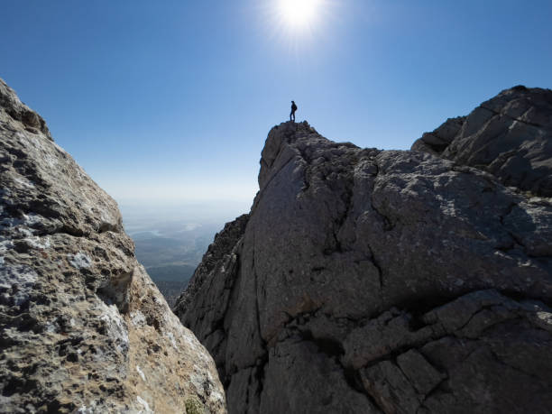 intrepid and adventurous explorer's hikes in wild mountains
