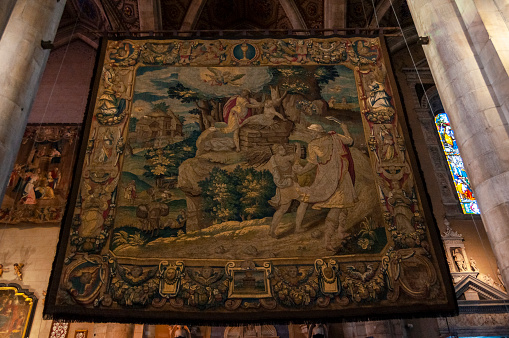 An old silk carpet inside a church in Italy