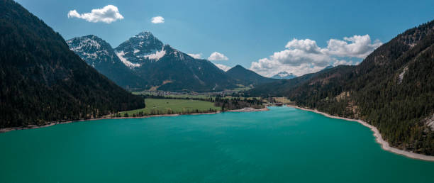 istock Lake Plansee with mountains in Tyrol Austria from above 1415963205