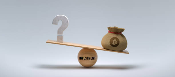 istock wooden scale balancing bitcoin and a questionmark - 3d illustration 1415965048