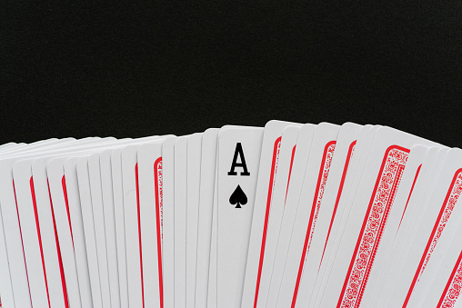 Playing cards on black background studio shot close up
