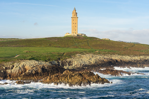 Hercules tower roman lighthouse in the city of A Coruña in a sunny day, Galicia, Spain.