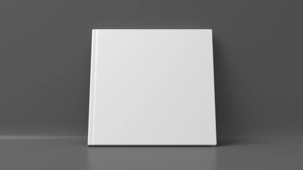 istock Blank square hardcover book cover mockup standing on gray background 1415971819
