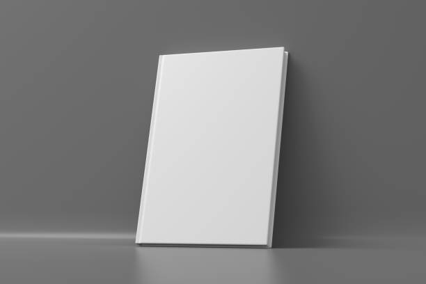 istock Blank vertical hardcover book cover mockup standing on gray background 1415971834
