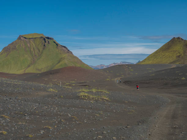 istock Panoramic view on green Hattafell mountain in Volcanic landscape behind Emstrur camping site on Laugavegur trek in area of Fjallabak Nature Reserve in Highlands region of Iceland 1415975058