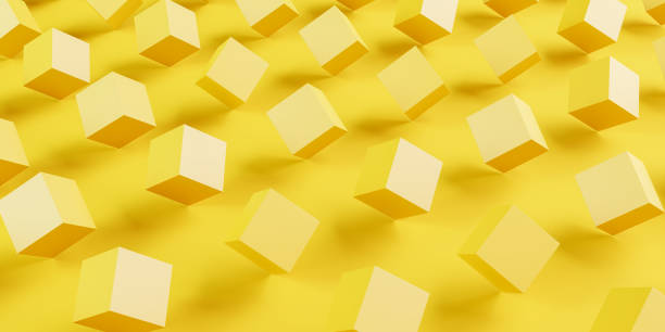 istock Abstract background: Yellow cubes balancing on a yellow plane. 1415978272