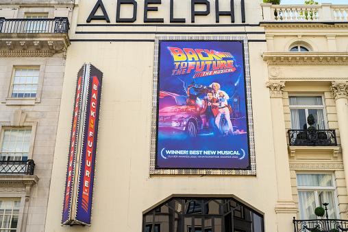 LONDON - May 18, 2022: Back to the Future, The Musical sign on the front of The Adelphi Theatre, London