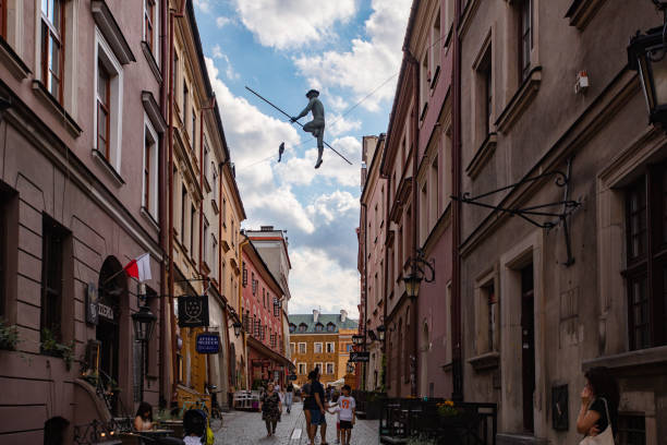 Lublin, Poland - August 2, 2022: Equilibrist statue in Lublin, Poland