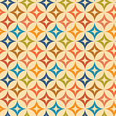 istock Mid century modern colorful starburst on beige circles seamless pattern. 1415985975