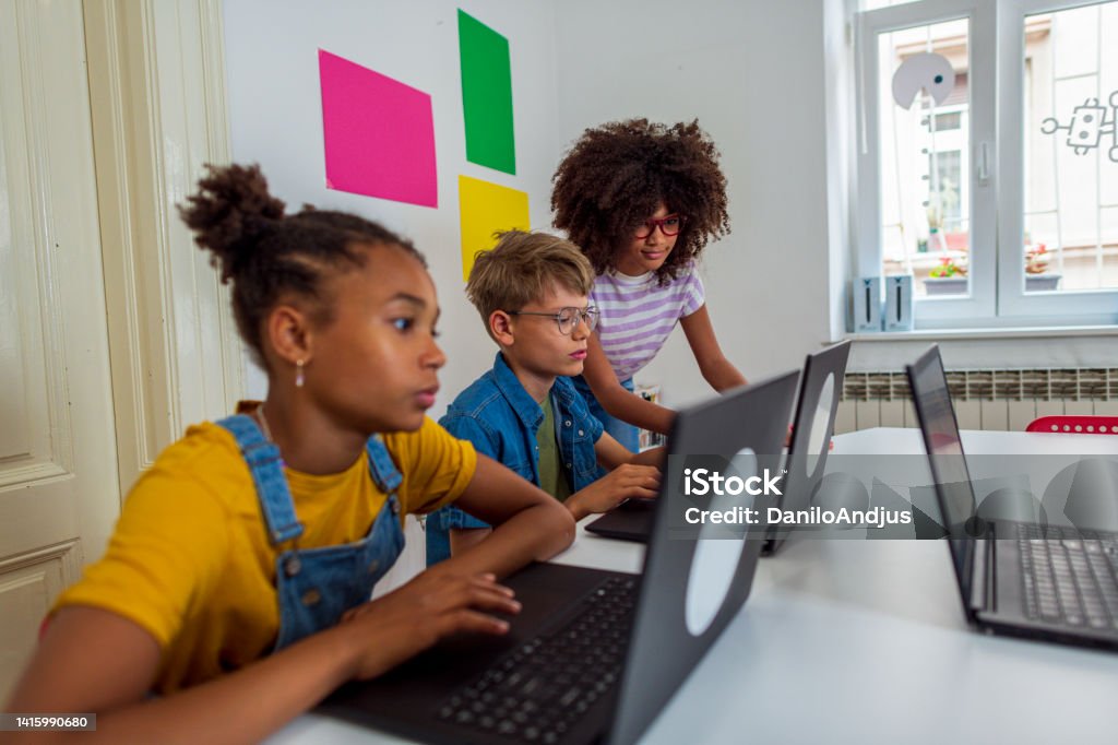 Students Learning Coding Language Young Students Learn About Coding In Elementary School Stock Photo ...
