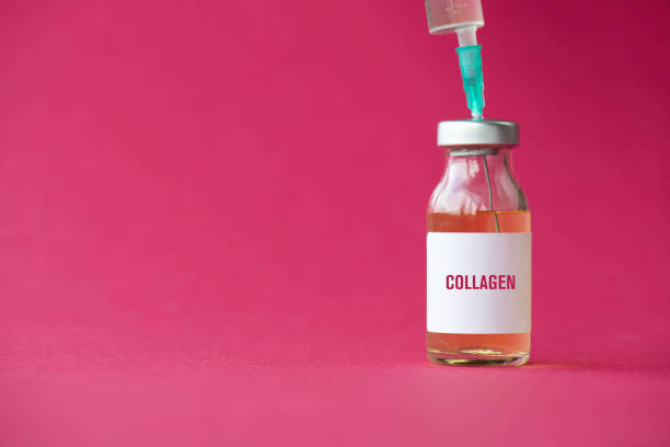 Collagen Vaccine Glass Bottle and Syringe stock photo