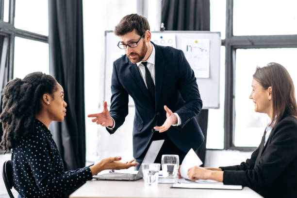 istock Teamwork, collaboration concept. Successful multiracial office employees, business partners, working together on important project in modern office, discussing strategy and business plan 1415996152