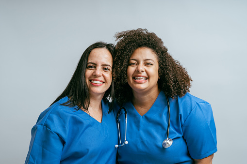 Portrait of smiling female healthcare professionals
