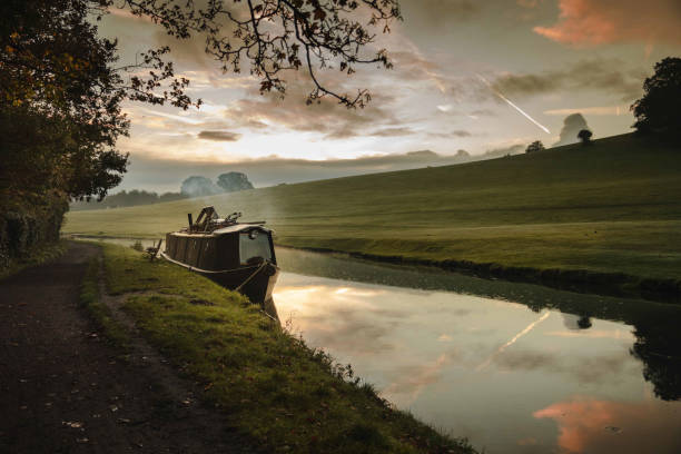 istock Canal boat at dawn on a peaceful Monday 1415997884