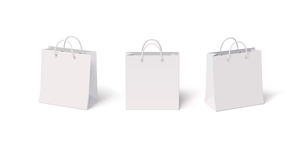 Set of white paper isolated shopping bags with front and side view. Vector realistic 3D blank mockup illustration of packets with plastic handles