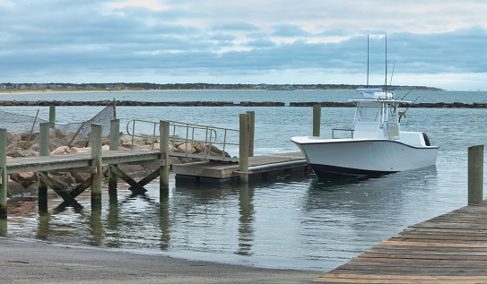 A boat sitting at the dock in South Yarmouth, in Barnstable County, Massachusetts