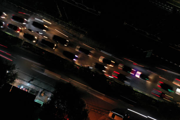 istock Vehicle Movement on the Road at Night 1416007361