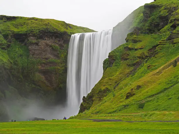 Beautiful Skogafoss waterfall in Iceland - long exposure melted