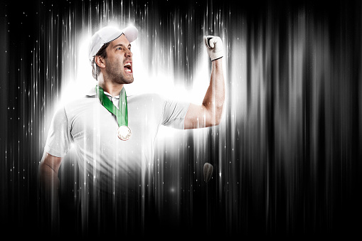 Golf Player with a white uniform on a black and white background looking like a super hero.