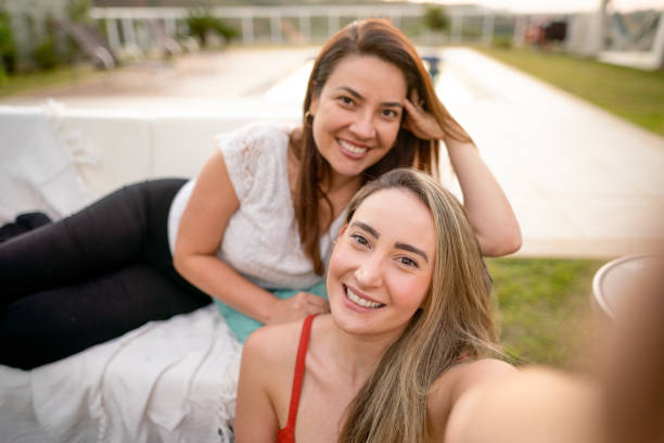 istock Two women taking a selfie in the backyard 1416012951