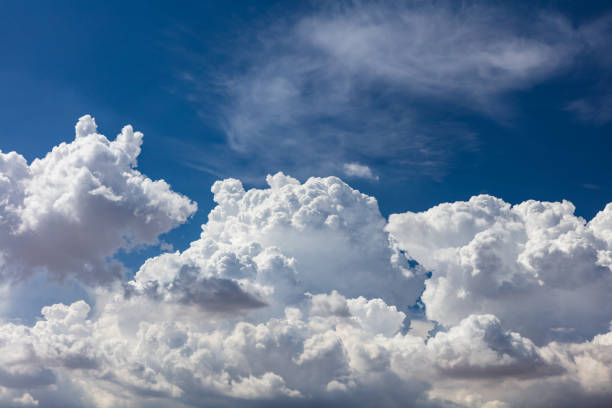 istock Closeup, cumulus clouds. Blue sky in background. 1416014297