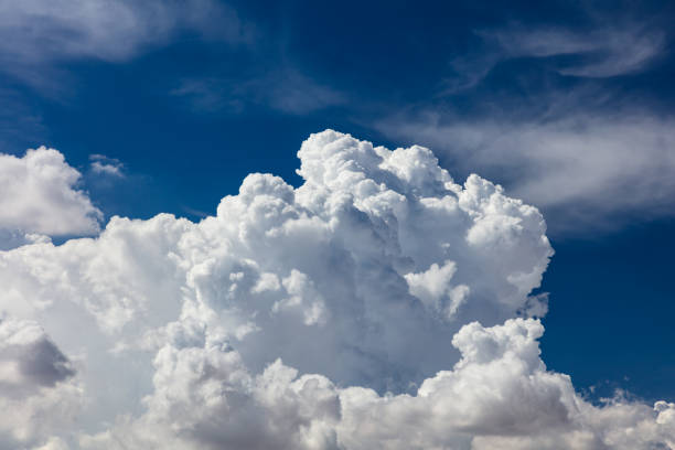istock Closeup, cumulus clouds. Blue sky in background. 1416014369