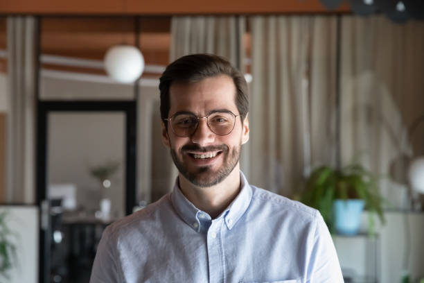 istock Confident young ceo executive male manager posing indoors. 1416018882