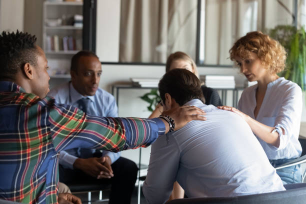 istock Compassionate young diverse business people supporting depressed colleague. 1416019213