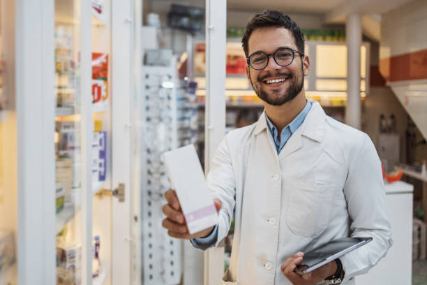 istock Young female pharmacist working in drugstore 1416020936