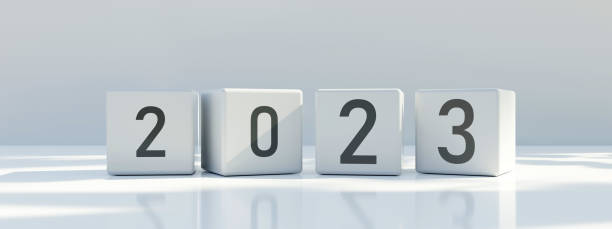 istock 2023 Happy New Year. Gray cube block with black digit on grey background, banner. 3d render 1416021720
