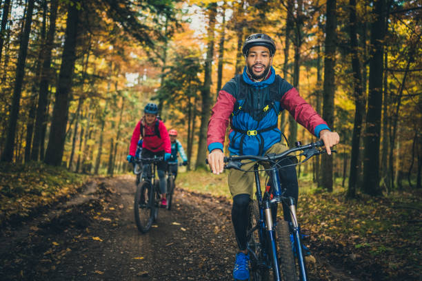 istock Group of mountain bikers cycling on path 1416022310